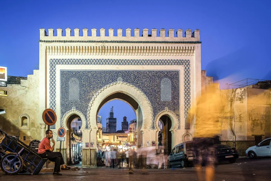 Historic medina of Fes with vibrant market stalls and ancient architecture – a must-see stop on any Morocco itinerary.