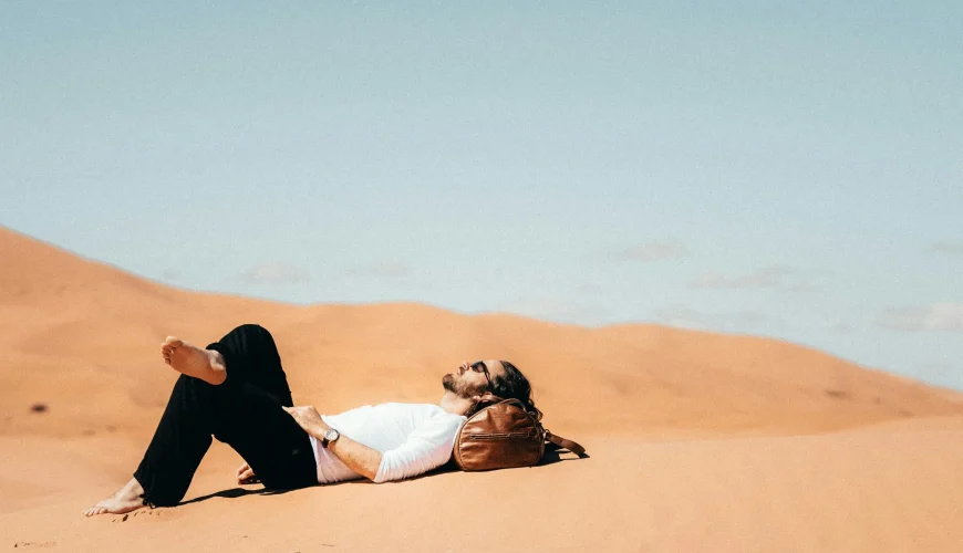 Tourists watching the beauty of on a morocco sahara desert tour